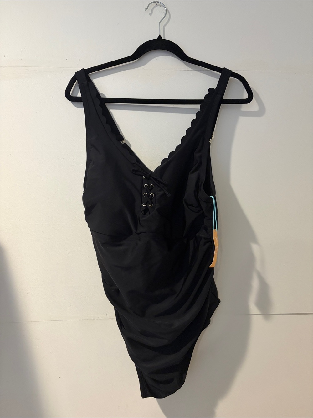 Classic Black One-Piece Swimsuit with Lace-Up Front
